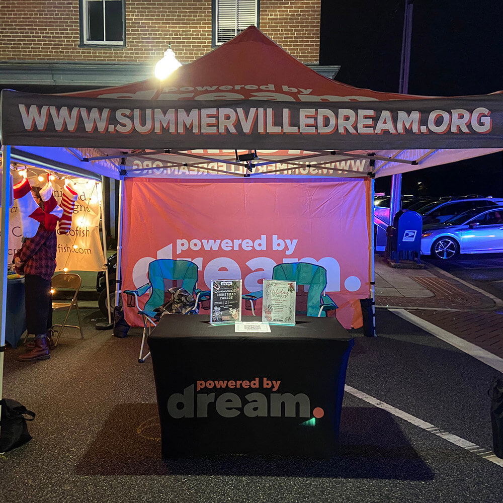 The Summerville DREAM information tent at a Third Thursday event